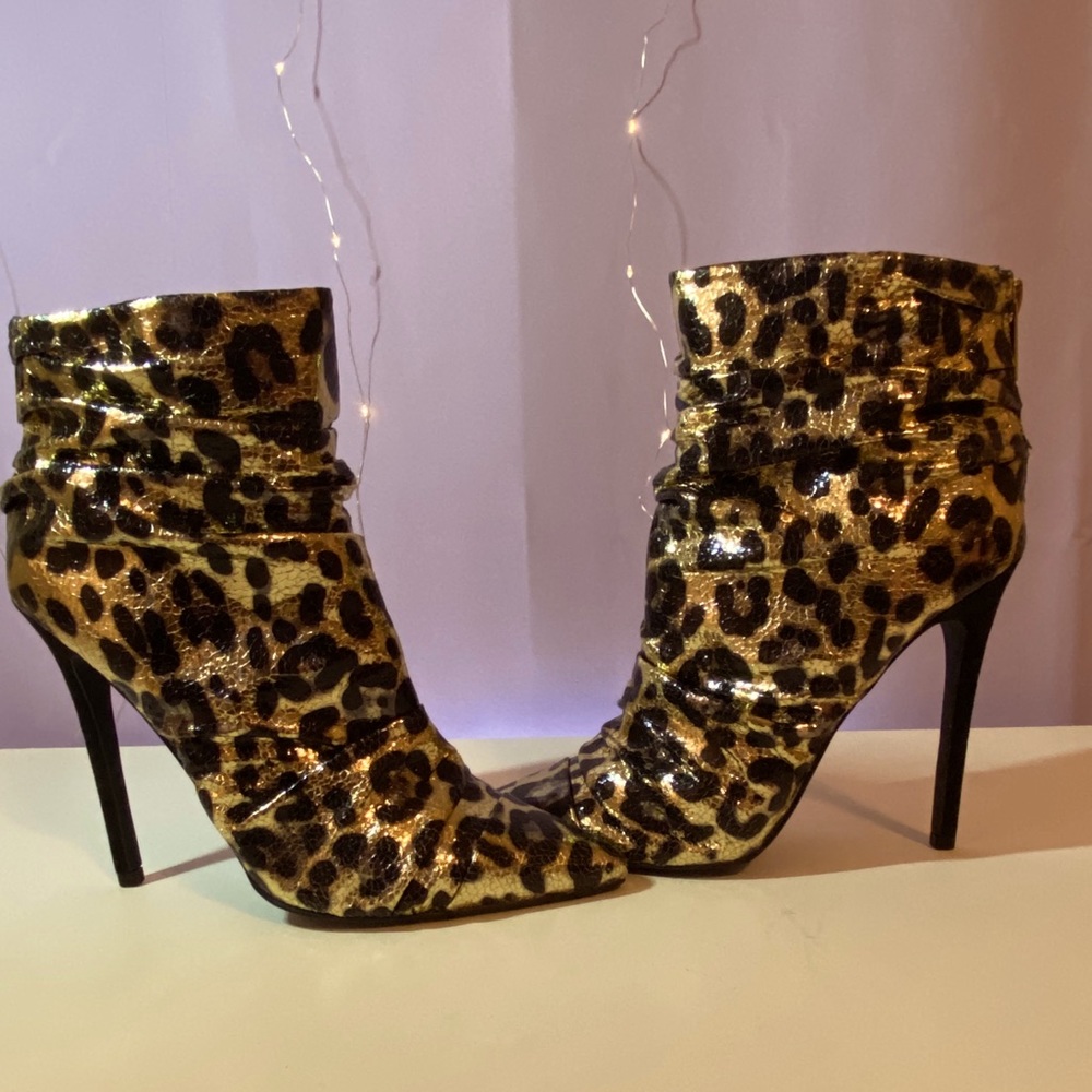 Black and gold booties, brand new, never worn.